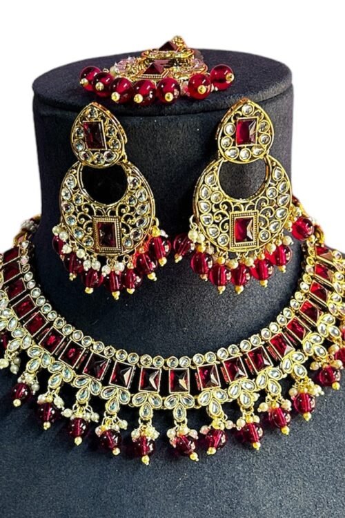 new rani pink color beads white kundan stone gold plated necklace set with earings and maangtika